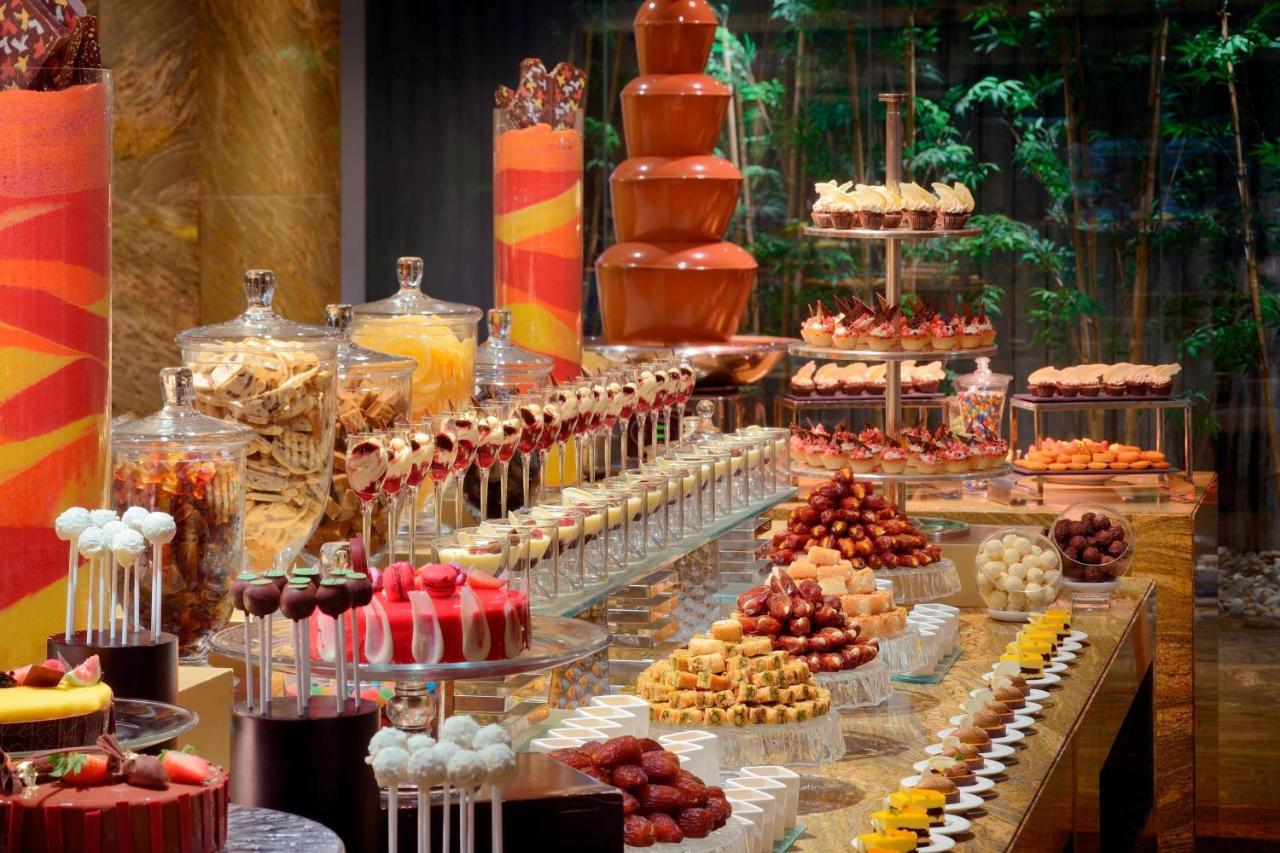 Jw Marriott Marquis Hotel Dubai Exterior photo A dessert buffet